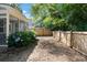Backyard featuring a lush garden area, wooden fence, and space for outdoor activities and landscaping at 1199 Landau Ln, Mount Pleasant, SC 29466