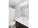 Well lit bathroom featuring a shower/tub combo, white vanity, and a decorative mirror at 1199 Landau Ln, Mount Pleasant, SC 29466