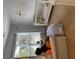 Cozy Bedroom with a white crib, comfortable seating, and soft natural light at 1199 Landau Ln, Mount Pleasant, SC 29466