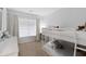 Bedroom featuring a white bunk bed, dresser and a large window allowing for natural light at 1199 Landau Ln, Mount Pleasant, SC 29466