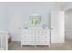 Bright Bedroom features a modern changing table with a mirror and two closets at 1199 Landau Ln, Mount Pleasant, SC 29466