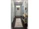 Inviting entryway featuring dark hardwood floors, console table, and a stylish area rug at 1199 Landau Ln, Mount Pleasant, SC 29466