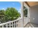 Wide porch with white railings provides stunning neighborhood views and ample natural light at 1199 Landau Ln, Mount Pleasant, SC 29466