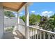 Wide porch with white railings provides stunning neighborhood views and ample natural light at 1199 Landau Ln, Mount Pleasant, SC 29466