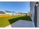 A large backyard with a grassy area, perfect for outdoor activities with patio and a view of the home at 1215 Homecoming Blvd # Cc2-1-25, Ravenel, SC 29470