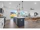 Modern kitchen with stainless steel appliances, island with pendant lights, and an open floor plan at 1215 Homecoming Blvd # Cc2-1-25, Ravenel, SC 29470