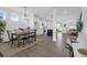 Bright, open-concept living space featuring modern kitchen and dining area with stylish decor at 1215 Homecoming Blvd # Cc2-1-25, Ravenel, SC 29470