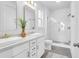 Modern bathroom boasts double sinks, sleek fixtures, and a glass-enclosed shower at 1217 Homecoming Blvd # Cc2-1-26, Ravenel, SC 29470