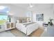 Bright and airy bedroom with neutral decor, a ceiling fan, and large windows at 1217 Homecoming Blvd # Cc2-1-26, Ravenel, SC 29470