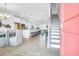Inviting entryway view, showcasing the open floor plan, dining area, kitchen, and staircase at 1217 Homecoming Blvd # Cc2-1-26, Ravenel, SC 29470