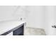 Clean and functional laundry room area with shelving and countertop space for folding and organizing at 1217 Homecoming Blvd # Cc2-1-26, Ravenel, SC 29470