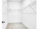 Spacious walk-in closet with carpet and wire shelving, providing ample storage in a clean, organized space at 1217 Homecoming Blvd # Cc2-1-26, Ravenel, SC 29470