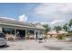 Charming restaurant with outdoor seating area, landscaped planters, and adjacent parking at 1224 Midvale Ave, Charleston, SC 29412