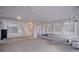 Spacious garage area with stairs, white wood framing, and lots of open space for storage and projects at 1224 Midvale Ave, Charleston, SC 29412