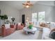 Cozy living room with high ceilings, comfortable seating, and plenty of natural light at 1224 Midvale Ave, Charleston, SC 29412