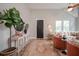 Stylish living room with hardwood floors, modern decor, and plenty of natural light at 1224 Midvale Ave, Charleston, SC 29412