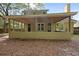 A wide view of the back porch, showing its construction, design, and access to the yard at 123 Lewisfield Dr, North Charleston, SC 29418