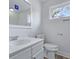 Freshly renovated bathroom with new fixtures, vanity, mirror and updated flooring at 123 Lewisfield Dr, North Charleston, SC 29418