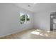 Bright bedroom with two windows, modern flooring and fresh paint throughout at 123 Lewisfield Dr, North Charleston, SC 29418