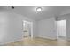Spacious bedroom with wood-look floors leading to an attached bathroom at 123 Lewisfield Dr, North Charleston, SC 29418