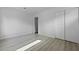 This bedroom has modern flooring, a large closet, and new paint throughout at 123 Lewisfield Dr, North Charleston, SC 29418