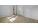 Bright bedroom featuring modern flooring, a closet and fresh paint throughout at 123 Lewisfield Dr, North Charleston, SC 29418