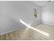 Bright room featuring modern flooring, fresh paint and large window overlooking the yard at 123 Lewisfield Dr, North Charleston, SC 29418