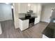 Functional kitchen with white cabinets, modern appliances, and plenty of counter space at 123 Lewisfield Dr, North Charleston, SC 29418
