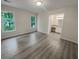 Bright main bedroom showcasing ample natural light and an adjoining bathroom at 123 Lewisfield Dr, North Charleston, SC 29418