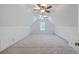 A top floor room with a high ceiling and a window at 125 Eston Dr, Goose Creek, SC 29445