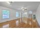 Spacious living room with hardwood floors, windows, and stairs at 125 Eston Dr, Goose Creek, SC 29445