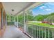 Inviting front porch with white railing overlooking neighborhood at 125 Eston Dr, Goose Creek, SC 29445