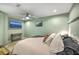 This bedroom features a ceiling fan, a TV, and neutral decor at 13 32Nd Ave, Isle of Palms, SC 29451