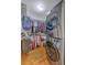 Well-organized walk-in closet with shelving, hanging rods and a modern washer/dryer at 13 32Nd Ave, Isle of Palms, SC 29451
