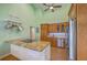 Spacious kitchen with granite countertops, stainless steel appliances, and a convenient hanging pot rack at 13 32Nd Ave, Isle of Palms, SC 29451