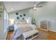 Relaxing main bedroom with vaulted ceilings, neutral decor, and bedside tables with lamps at 13 32Nd Ave, Isle of Palms, SC 29451