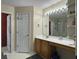 Bathroom featuring vanity, mirror, lighting, and nearby doorway at 1317 Wild Olive Dr, Mount Pleasant, SC 29464