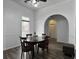 Traditional dining room featuring hardwood floors and an archway entrance at 1317 Wild Olive Dr, Mount Pleasant, SC 29464