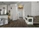 Bright entryway with wood flooring, white walls, and a view into other areas of the house at 1317 Wild Olive Dr, Mount Pleasant, SC 29464