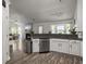 Open concept kitchen featuring stainless steel appliances and bright, airy living space at 1317 Wild Olive Dr, Mount Pleasant, SC 29464