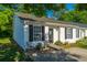 Charming townhouse with tidy landscaping and a cozy patio area with seating at 1327 Pinnacle Ln, Charleston, SC 29412