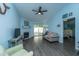 Cozy living room with a fireplace, comfortable seating, and plenty of natural light at 1327 Pinnacle Ln, Charleston, SC 29412
