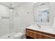 Bathroom featuring a glass-enclosed shower, a wood vanity, a vessel sink, and clean modern finishes at 1467 Battalion Dr, James Island, SC 29412