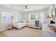 Bright bedroom featuring a crib, daybed, and neutral tones, creating a serene and inviting space at 1467 Battalion Dr, James Island, SC 29412