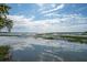 Expansive marsh view featuring water, clouds, and grasses with a beautiful sky reflection at 1467 Battalion Dr, James Island, SC 29412