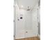 Shower featuring a clear glass door, rainfall shower head, modern tile, and a built in niche at 1467 Battalion Dr, James Island, SC 29412