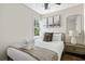 Comfortable bedroom featuring a queen bed, plush linens, and lots of natural light at 15 H Street St, Charleston, SC 29403
