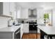 Well-appointed kitchen with stainless steel appliances, sleek countertops, and ample cabinet space at 15 H Street St, Charleston, SC 29403