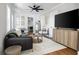 Stylish living room featuring modern furniture, a ceiling fan, and a neutral color palette at 15 H Street St, Charleston, SC 29403