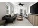 Bright living room with stylish furniture, a ceiling fan, and an elegant area rug at 15 H Street St, Charleston, SC 29403
